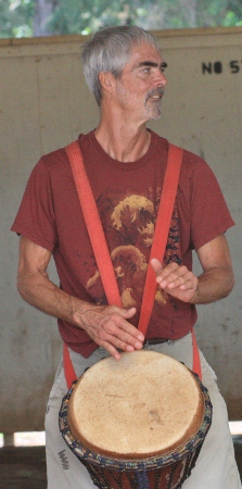 Nowick Gray playing djembe
